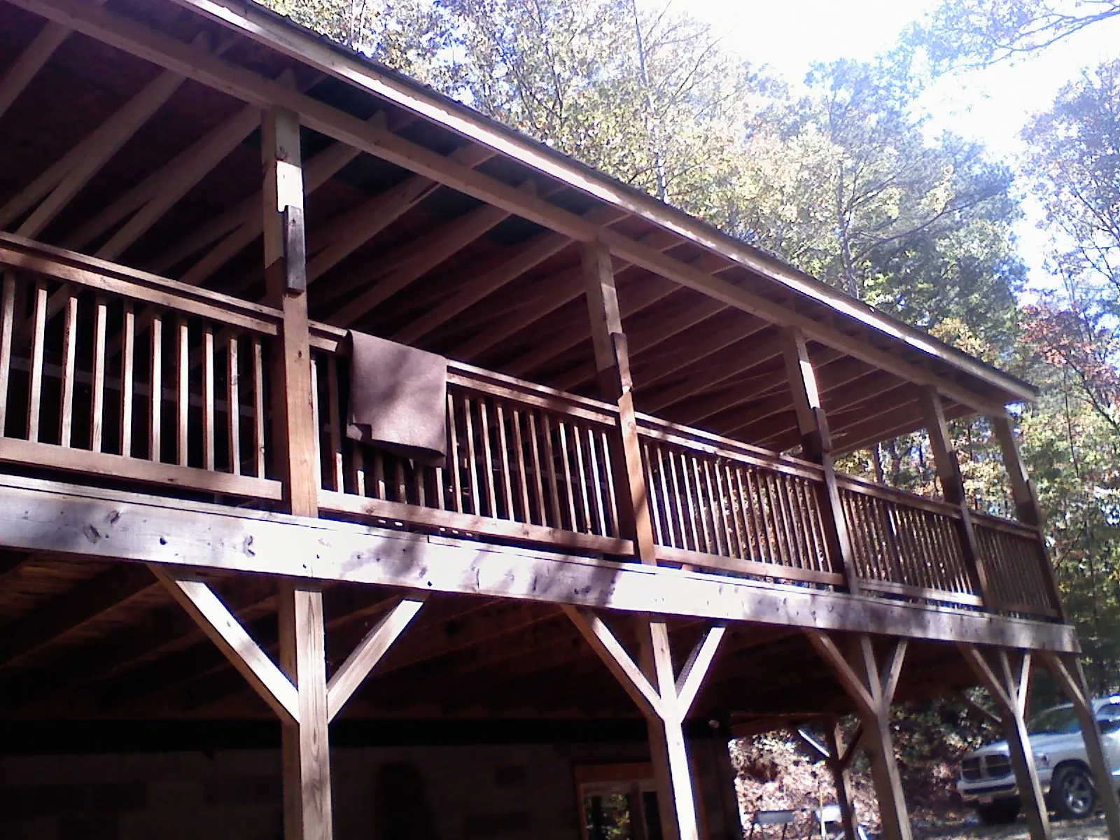 Timber framing under a new elevated porch and deck — Roof Leak Repair in Slaterville Springs by Roofing Brothers